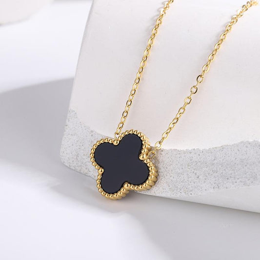 Double sided clover necklace in black & gold